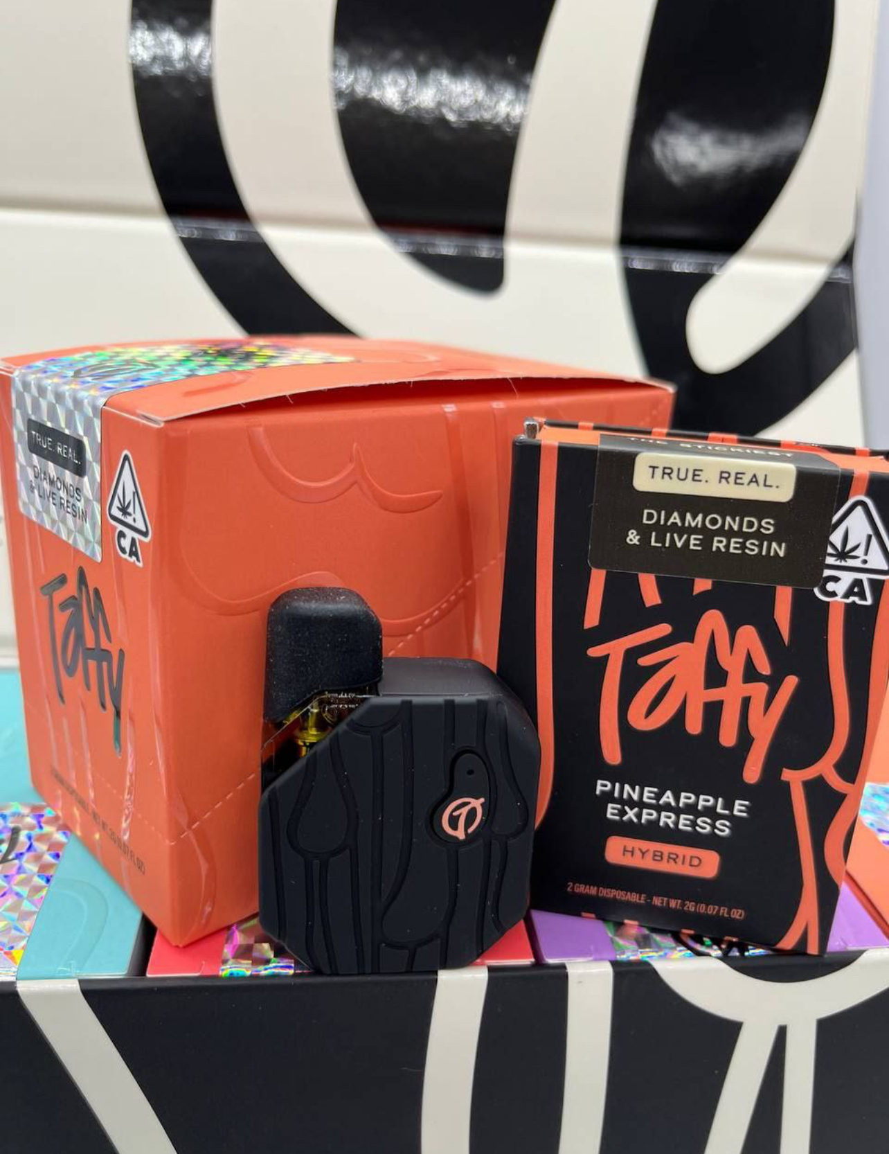 Taffy 2G Disposable Pineapple Express Hybrid features diamond-infused live resin oil, tropical pineapple terpenes, smooth vapor, and long-lasting 2-gram potency. Rechargeable THC disposable built for balanced effects. Taffy 2G Disposable Pineapple Express Hybrid features diamond-infused live resin oil, tropical pineapple terpenes, smooth vapor, and long-lasting 2-gram potency. Rechargeable THC disposable built for balanced effects.
