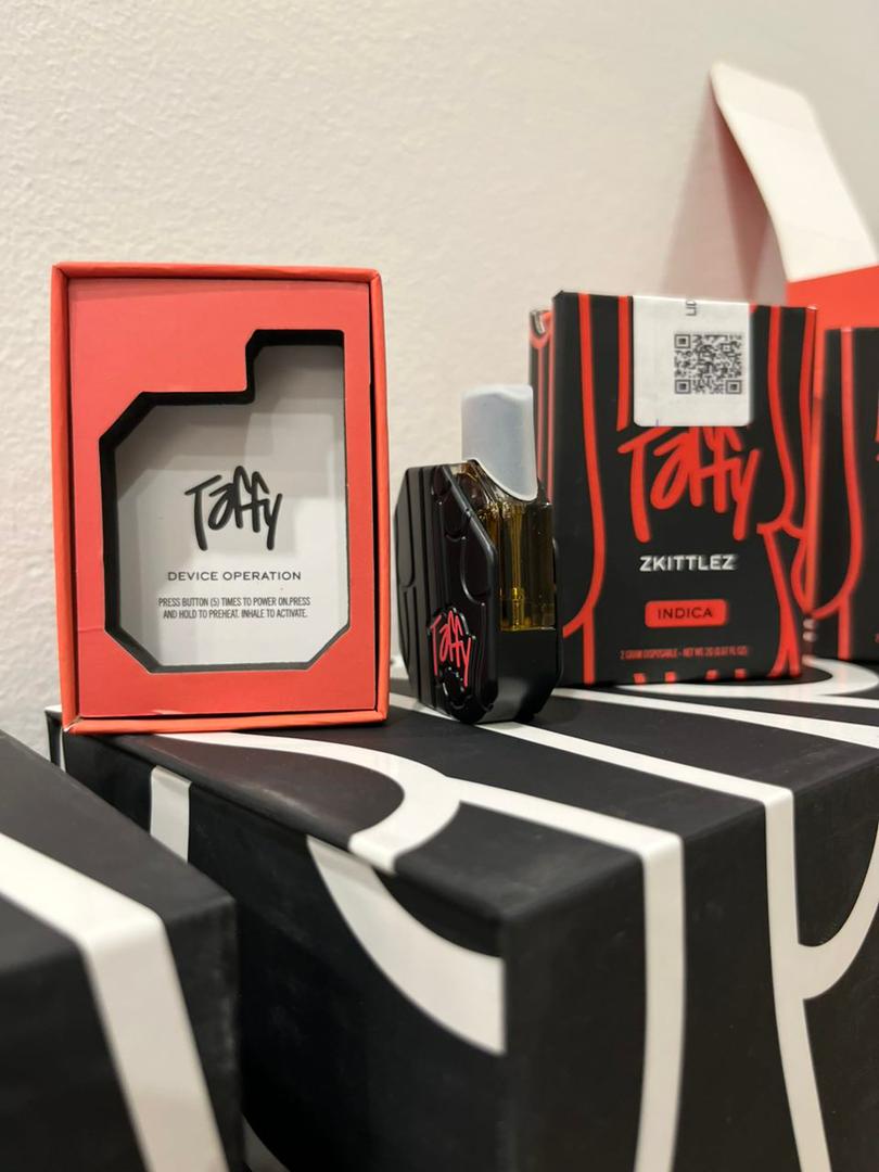 Taffy 2G Disposable Zkittlez flavor features diamond-infused live resin oil, sweet candy terpenes, smooth vapor, and long-lasting 2-gram potency. Rechargeable THC disposable built for balanced effects. Taffy 2G Disposable Zkittlez flavor features diamond-infused live resin oil, sweet candy terpenes, smooth vapor, and long-lasting 2-gram potency. Rechargeable THC disposable built for balanced effects.