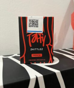 Taffy 2G Disposable Zkittlez flavor features diamond-infused live resin oil, sweet candy terpenes, smooth vapor, and long-lasting 2-gram potency. Rechargeable THC disposable built for balanced effects.