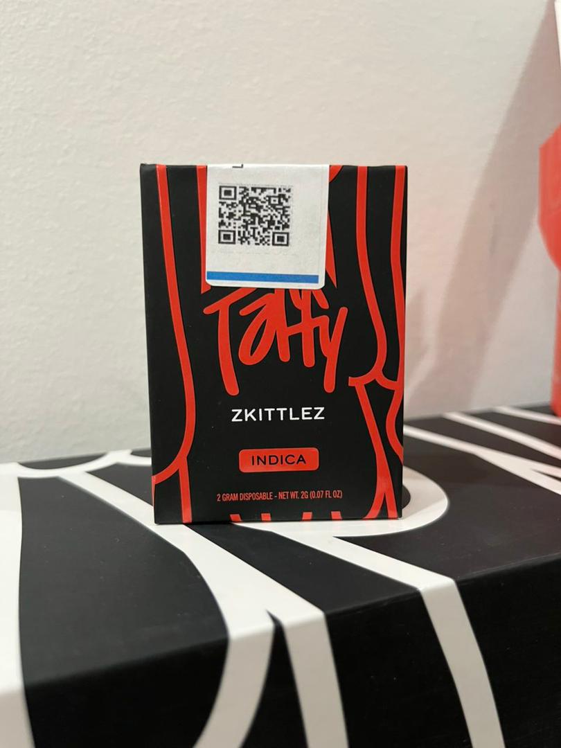 Taffy 2G Disposable Zkittlez flavor features diamond-infused live resin oil, sweet candy terpenes, smooth vapor, and long-lasting 2-gram potency. Rechargeable THC disposable built for balanced effects. Taffy 2G Disposable Zkittlez flavor features diamond-infused live resin oil, sweet candy terpenes, smooth vapor, and long-lasting 2-gram potency. Rechargeable THC disposable built for balanced effects.